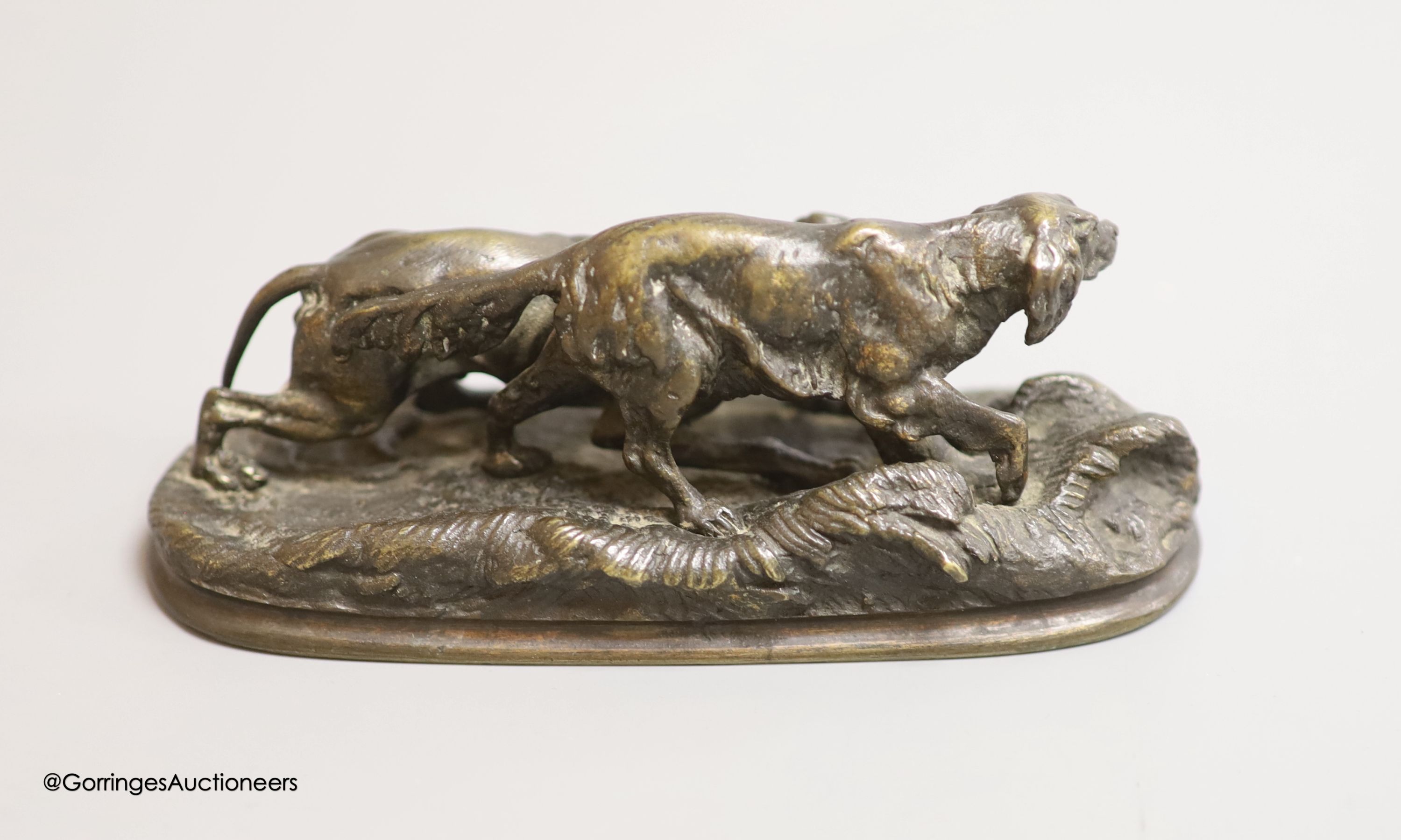 After P. J. Mene, a small bronze model of two gun dogs, Width 13.25cm